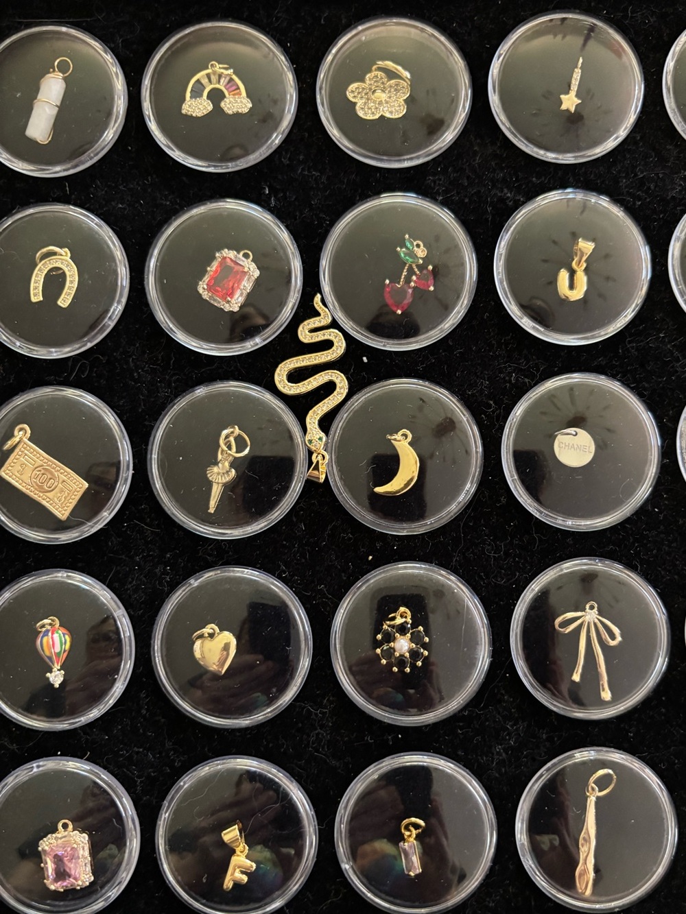 One designer charm and more . 148 pieces
